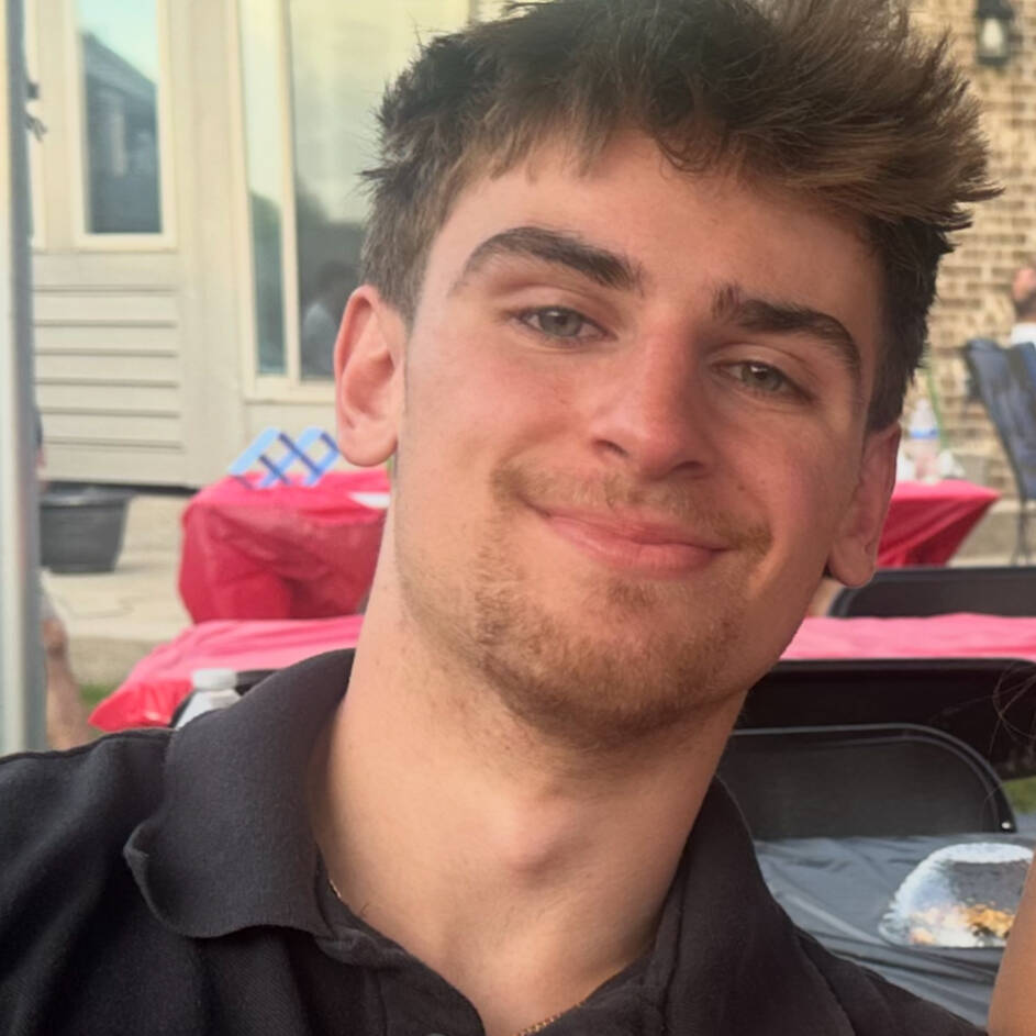 Smiling young man with brown hair